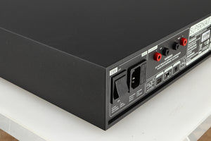 Rear right corner of a used Naim Supernait 2 Integrated Amplifier in a black finish