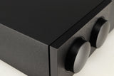 Close up of a used Naim Supernait 3 Integrated Amplifier in a black finish showing small chip on front left corner 
