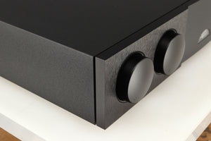 Front left corner of a used Naim Supernait 3 Integrated Amplifier in a black finish