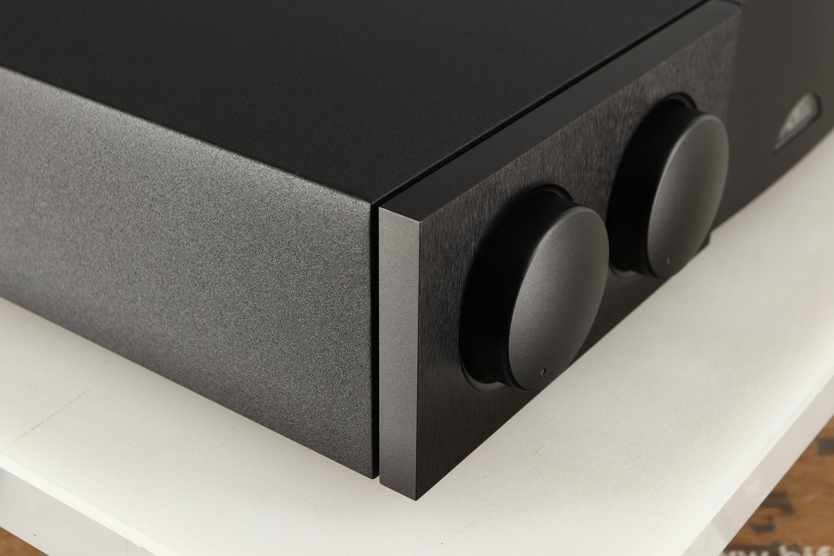 Front left corner of a used Naim Supernait 3 Integrated Amplifier in a black finish