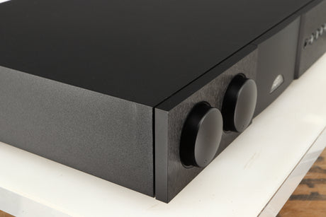 Front left corner of a used Naim Supernait 3 Integrated Amplifier in a black finish