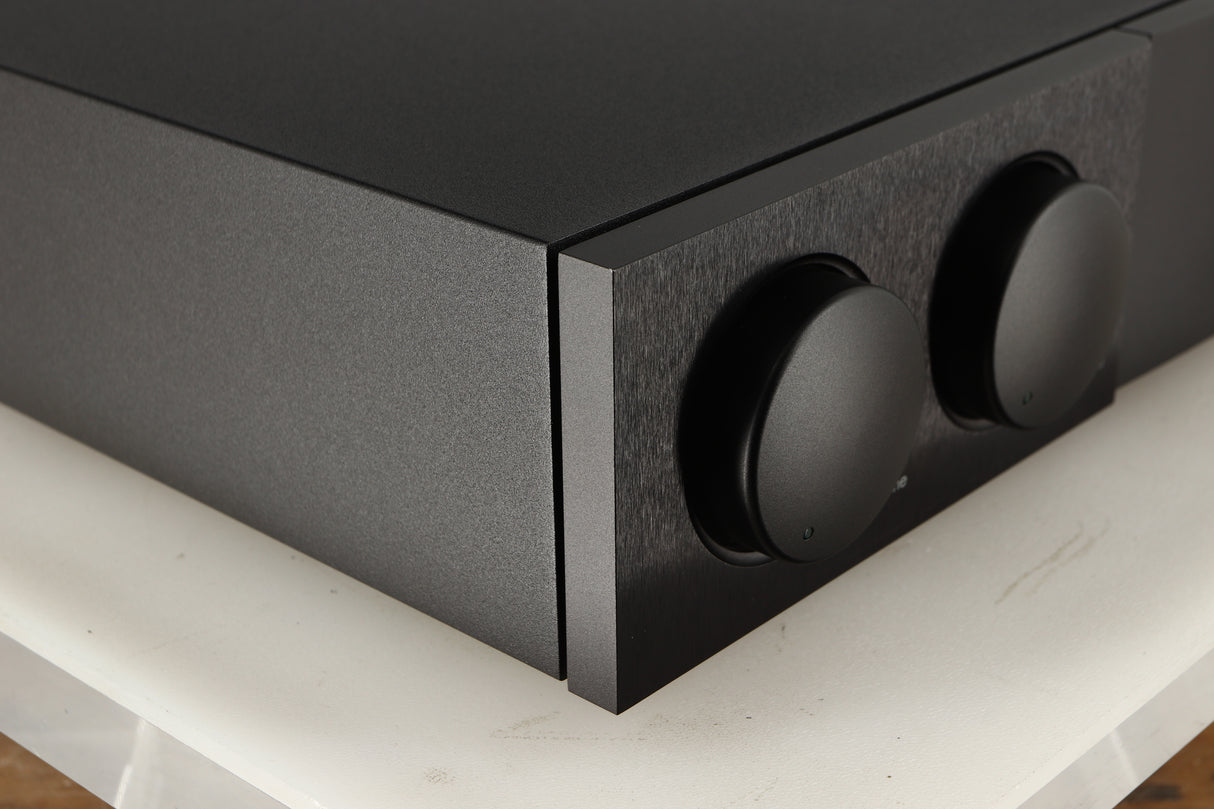 Front left corner of a used Naim Supernait 3 Integrated Amplifier in a black finish