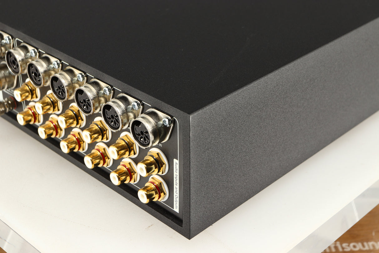 Rear left corner of a used Naim Supernait 3 Integrated Amplifier in a black finish