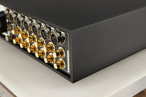 Rear left corner of a used Naim Supernait 3 Integrated Amplifier in a black finish