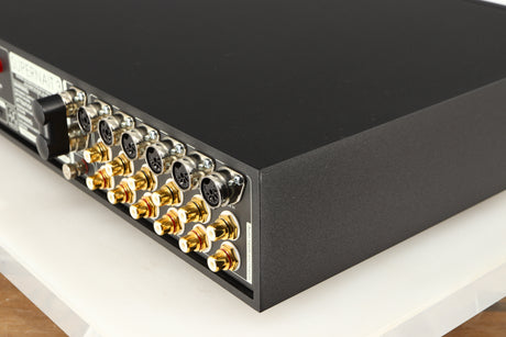Rear left corner of a used Naim Supernait 3 Integrated Amplifier in a black finish