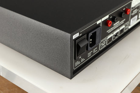 Rear right corner of a used Naim Supernait 3 Integrated Amplifier in a black finish