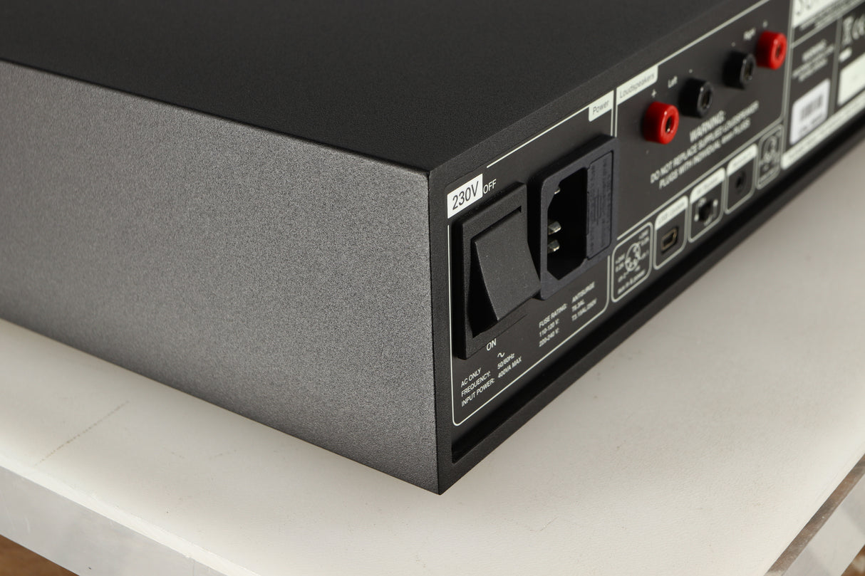 Rear right corner of a used Naim Supernait 3 Integrated Amplifier in a black finish