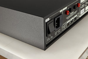 Rear right corner of a used Naim Supernait 3 Integrated Amplifier in a black finish