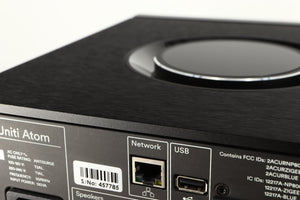 Close up of a used Naim Uniti Atom HDMI Integrated System in a black finish showing light scratching on rear