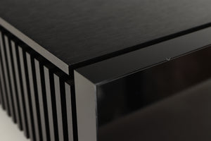 Close up of a used Naim Uniti Atom HDMI Integrated System in a black finish showing nick on top edge of screen