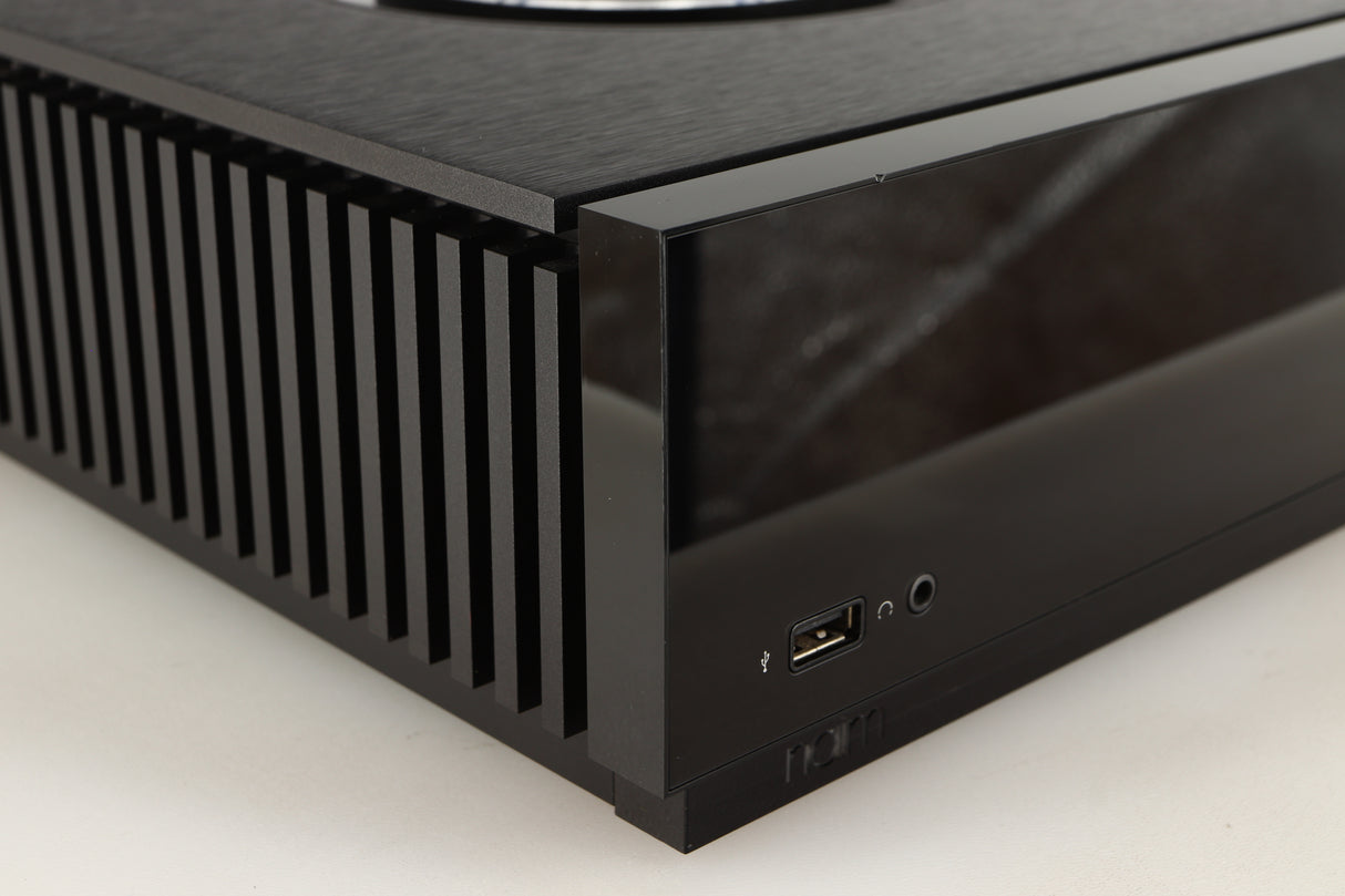 Front left corner of a used Naim Uniti Atom HDMI Integrated System in a black finish
