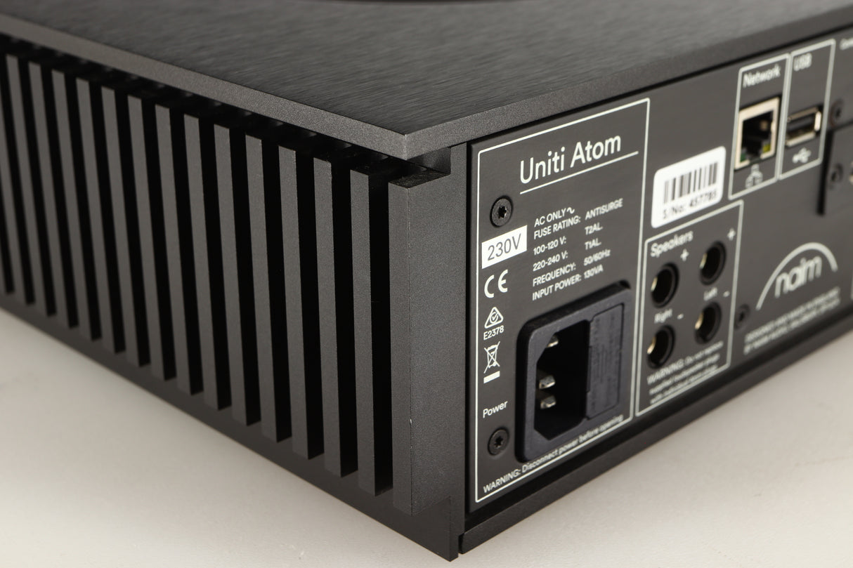 Rear right corner of a used Naim Uniti Atom HDMI Integrated System in a black finish
