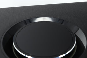 Close up view of a used Naim Uniti Atom HDMI Streaming Amplifier showing scratching on the gloss surface around the dial