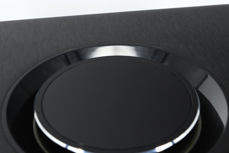 Close up view of a used Naim Uniti Atom HDMI Streaming Amplifier showing scratching on the gloss surface around the dial