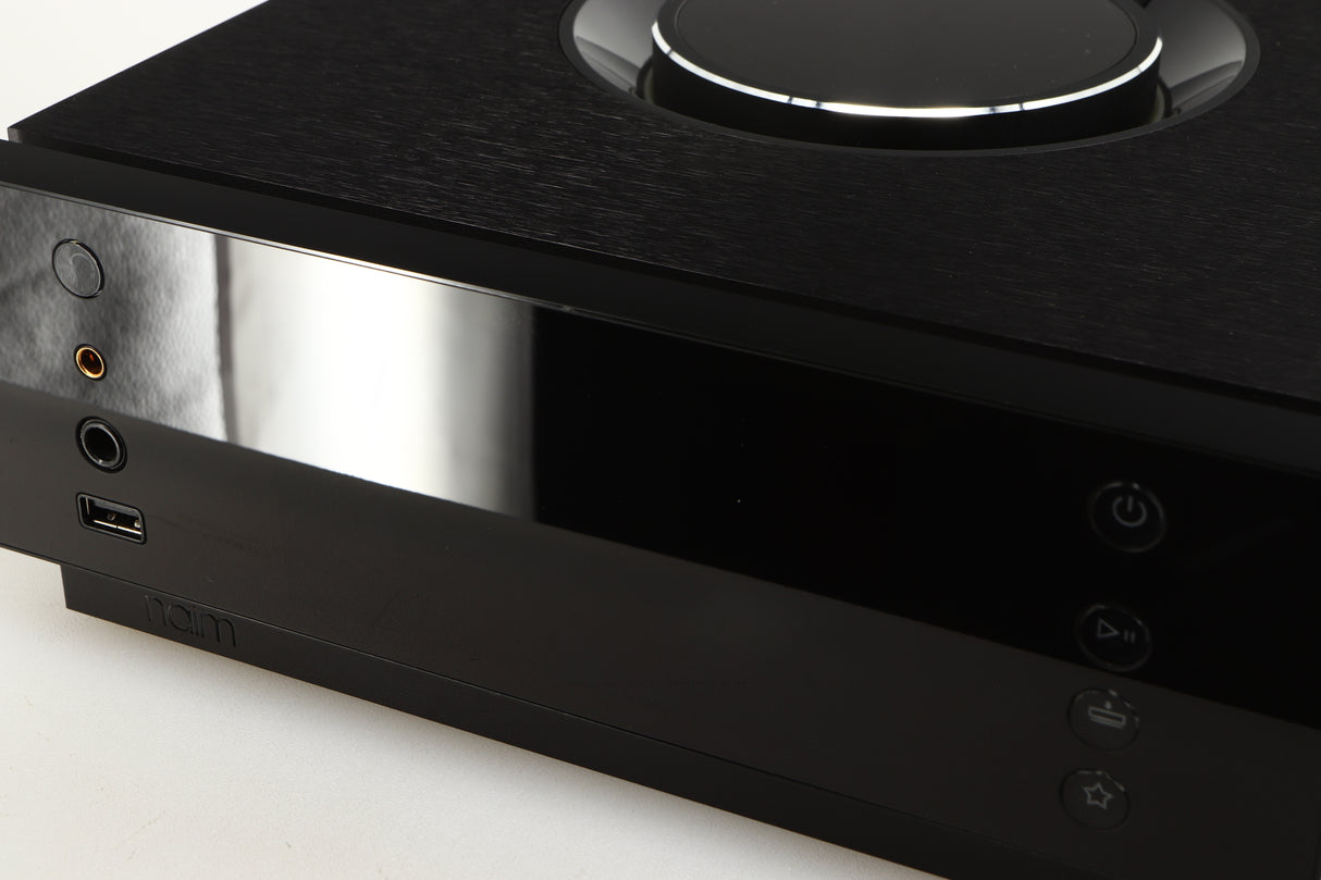 Close up of a used Naim Uniti Atom Headphone Edition Streaming Amplifier in a black finish showing some of the screen 