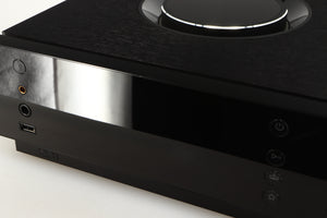 Close up of a used Naim Uniti Atom Headphone Edition Streaming Amplifier in a black finish showing some of the screen 