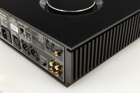 Rear left corner of a used Naim Uniti Atom Headphone Edition Streaming Amplifier in a black finish