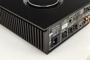 Rear right corner of a used Naim Uniti Atom Headphone Edition Streaming Amplifier in a black finish