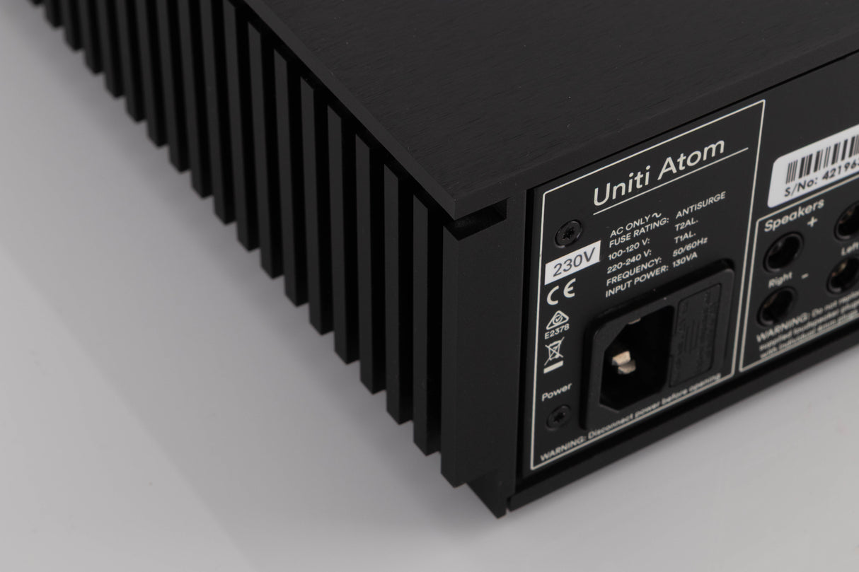 Rear right corner of a used Naim Uniti Atom Integrated System in a Black finish