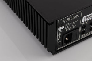 Rear right corner of a used Naim Uniti Atom Integrated System in a Black finish