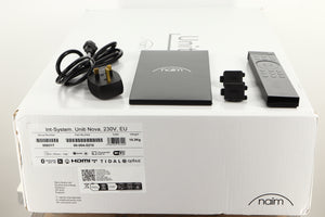 Box of a used Naim Uniti Nova Integrated Music System with mains cable, remote,manual, and 2x speaker plugs