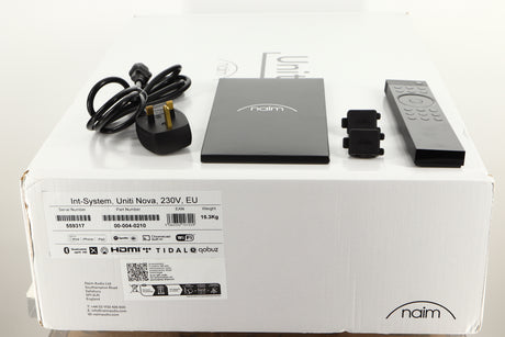 Box of a used Naim Uniti Nova Integrated Music System with mains cable, remote,manual, and 2x speaker plugs