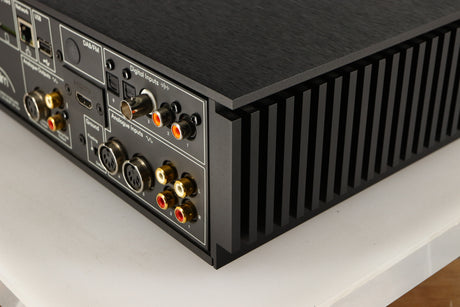Rear left corner of a used Naim Uniti Nova Integrated System in a black finish