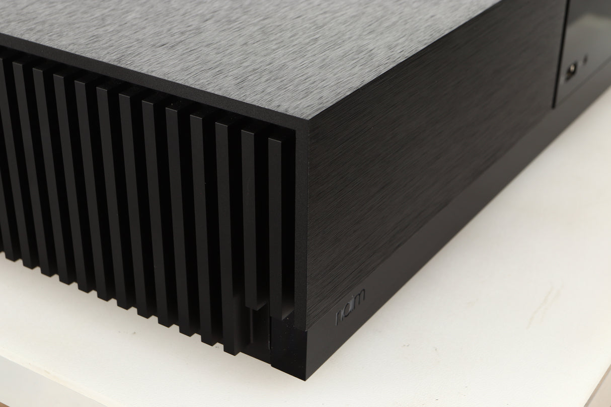 Front left corner of a Naim Uniti Nova Power Edition Streaming System in a black finish