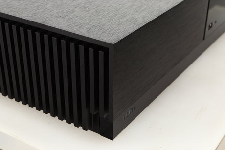 Front left corner of a Naim Uniti Nova Power Edition Streaming System in a black finish