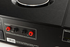 Close up of a used Naim Uniti Star Integrated Music System in a black finish showing scratches on rear