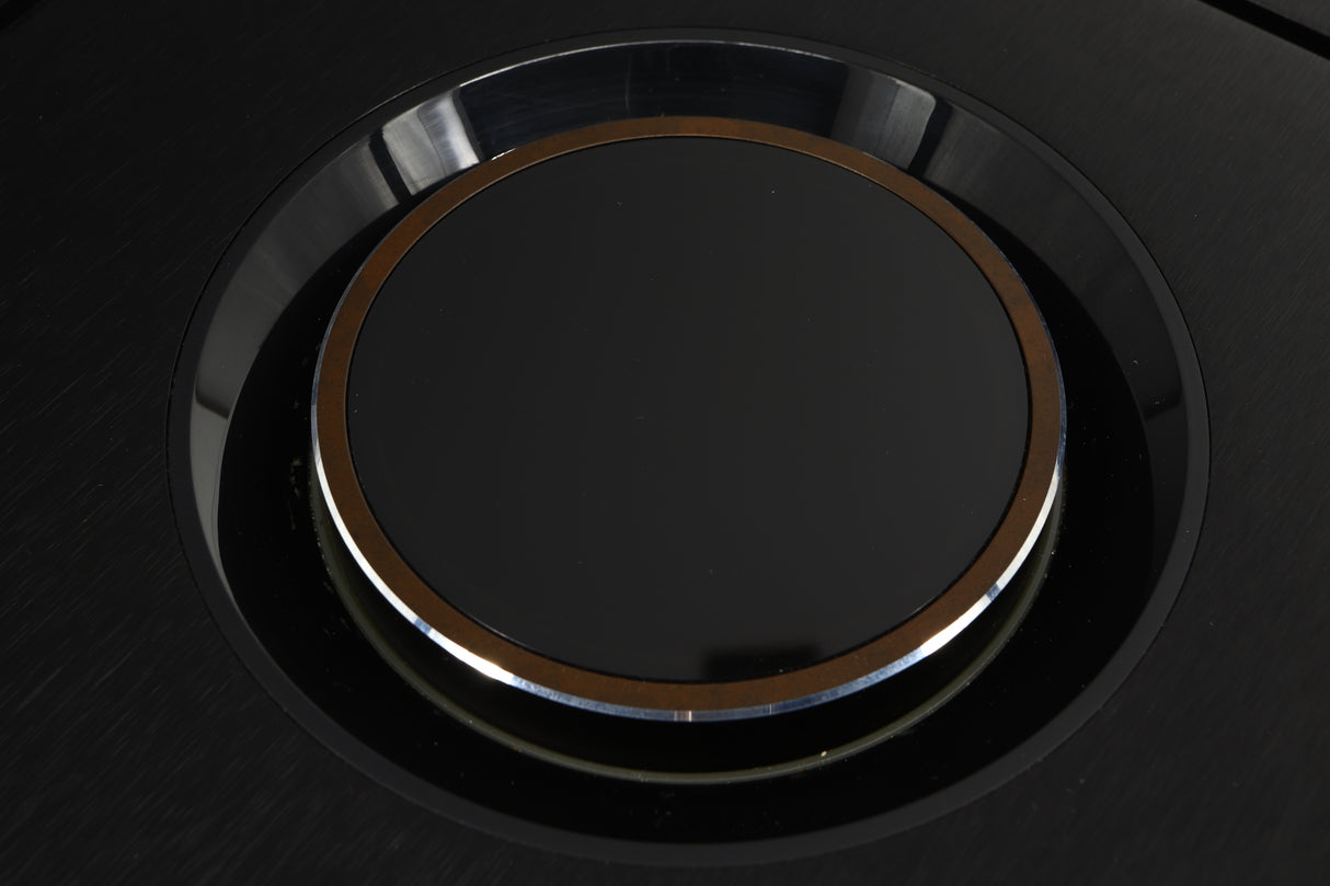 Close up of a used Naim Uniti Star Integrated Music System in a black finish showing scratches inside of the  knob