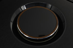 Close up of a used Naim Uniti Star Integrated Music System in a black finish showing scratches inside of the  knob