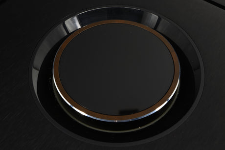 Close up of a used Naim Uniti Star Integrated Music System in a black finish showing scratches inside of the  knob