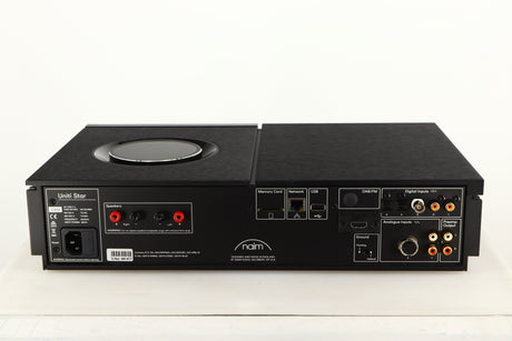 Rear view of a used Naim Uniti Star Integrated Music System in a black finish showing Phono Inputs, Phono Outputs, USB Input, Network Input, Speaker Outputs, Mains Input, DIN Input and Optical Inputs