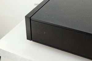 Close up view of a used Naim XP5 XS Power Supply right side showing a small mark