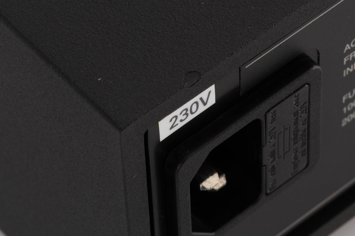 Close up of a used Naim XPS-2 Power Supply in a Black finish showing chip on rear edge