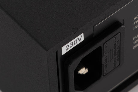 Close up of a used Naim XPS-2 Power Supply in a Black finish showing chip on rear edge