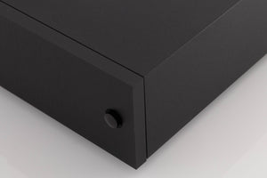 Front right corner of a used Naim XPS-2 Power Supply in a Black finish