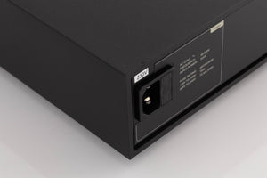 Rear right corner of a used Naim XPS-2 Power Supply in a Black finish
