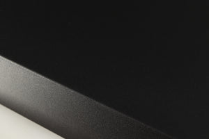 Close up of a used Naim XPS DR Power Supply in a black finish showing light scratch on left edge