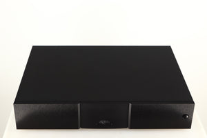 Top of a used Naim XPS DR Power Supply in a black finish