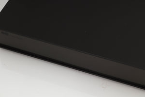 Close up of a used Naim XPS Power Supply in a black finish showing some of the fascia