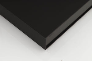 Front left corner of a used Naim XPS Power Supply in a black finish