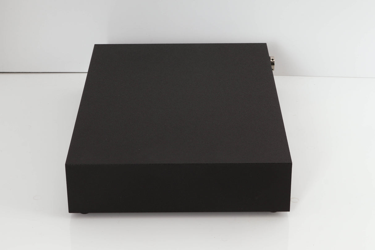 Right side view of a used Naim XPS Power Supply in a black finish