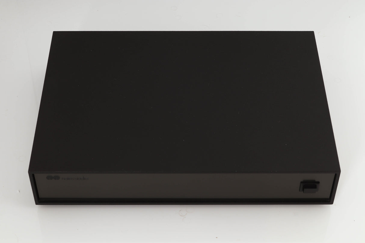 Top of a used Naim XPS Power Supply in a black finish
