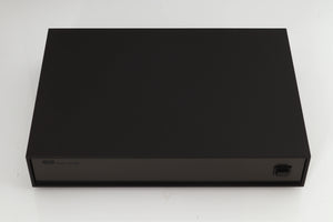 Top of a used Naim XPS Power Supply in a black finish
