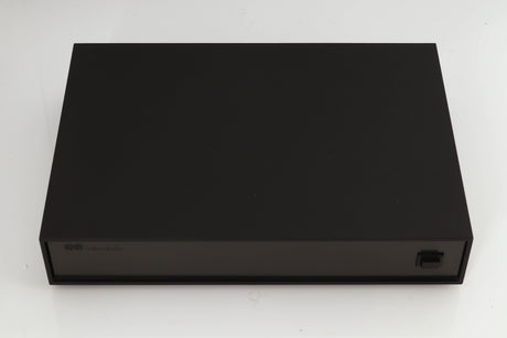 Top of a used Naim XPS Power Supply in a black finish