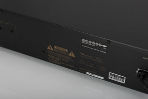 Close up of a used Nakamichi DR-3 Cassette Deck in a black finish showing serial number
