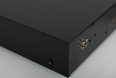 Rear right corner of a used Nakamichi DR-3 Cassette Deck in a black finish