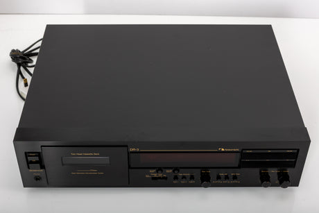 Top of a used Nakamichi DR-3 Cassette Deck in a black finish